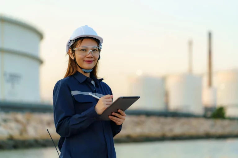 asian-engineer-woman-are-checking-maintenance-oil-refinery-factory-evening-via-digital-tablets-3